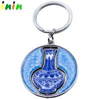 High quality silver rotated sticker blue and white porcelain key chain